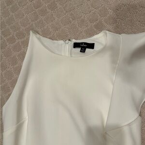 Lulu White Cocktail Dress size XS with Ruffle on one side.  Good Condition.